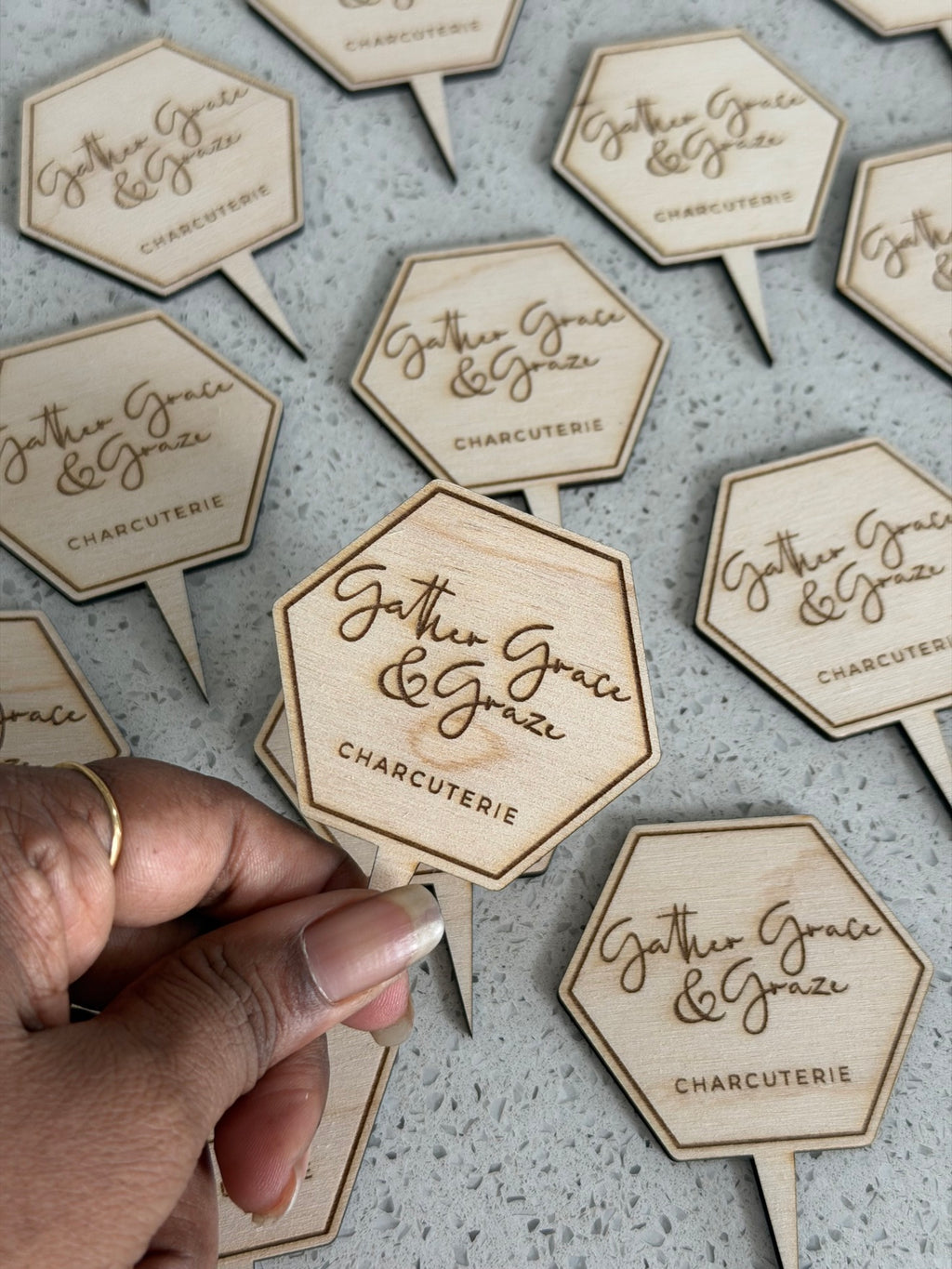 Custom laser engraved wooden grazing pins for charcuterie