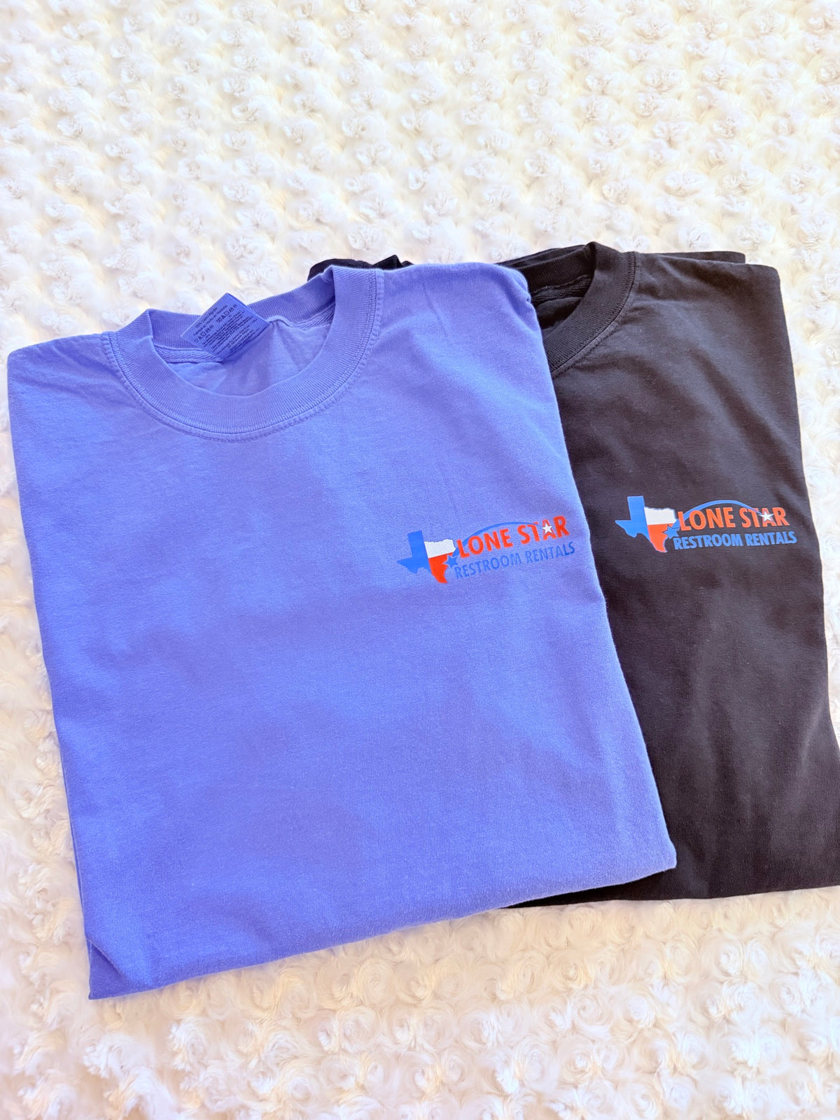 Custom DTF t-shirts with Lone Star Restroom Rentals logo in blue and black