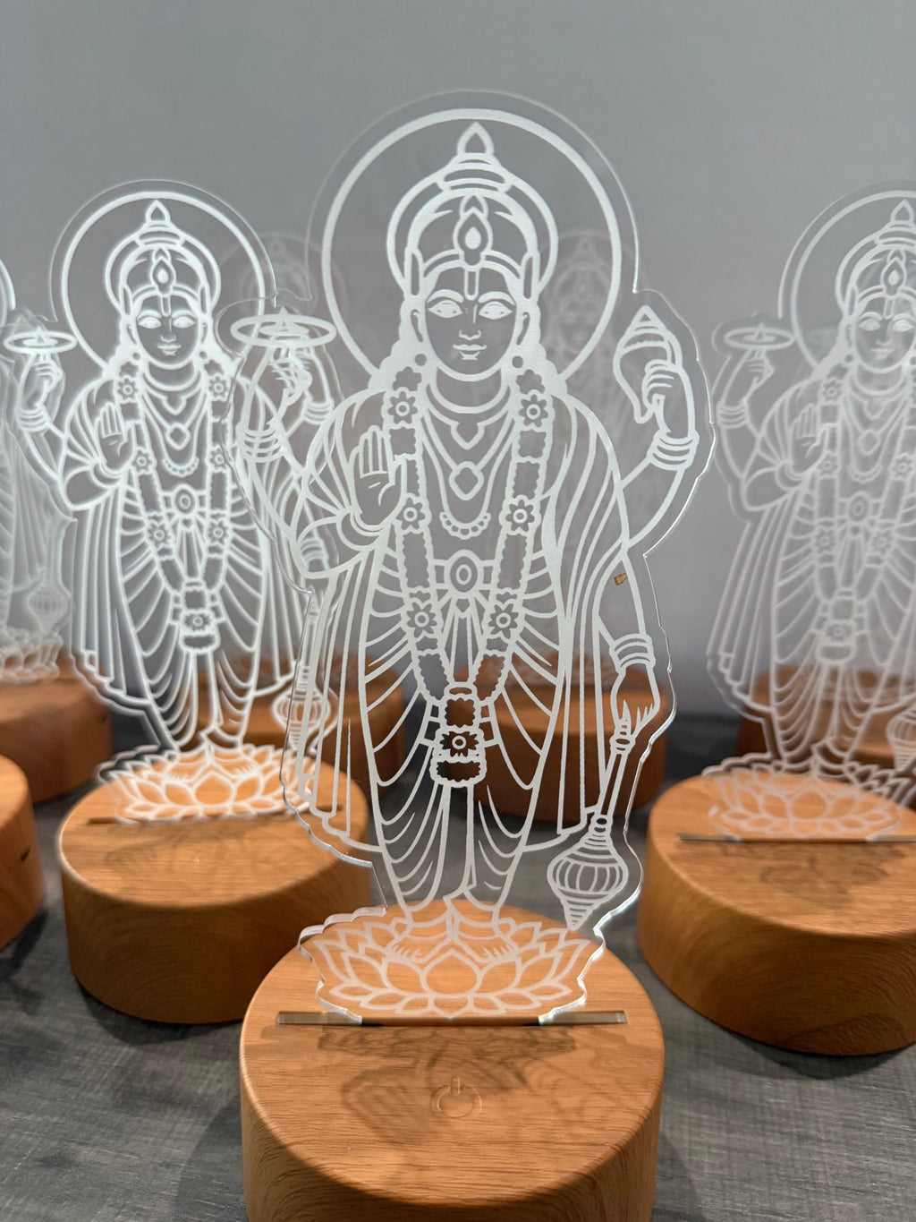 Bulk set of Satyanarayana LED night lights with engraved acrylic panels on wooden bases - perfect Indian return gifts