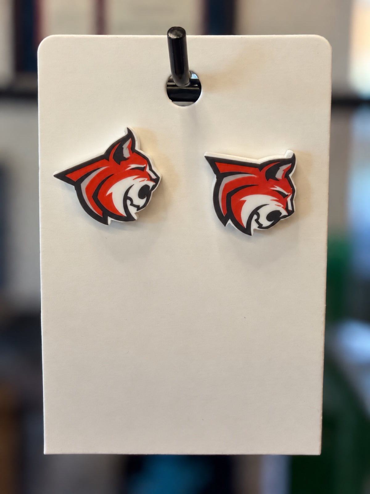 Acrylic Bobcat mascot head stud earrings in red white and black - Celina Bobcats school spirit jewelry