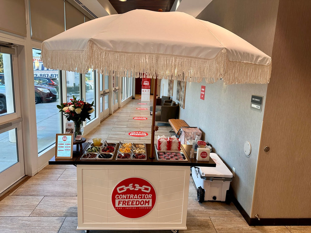 Custom round logo sign on a catering cart - business branding coroplast sign
