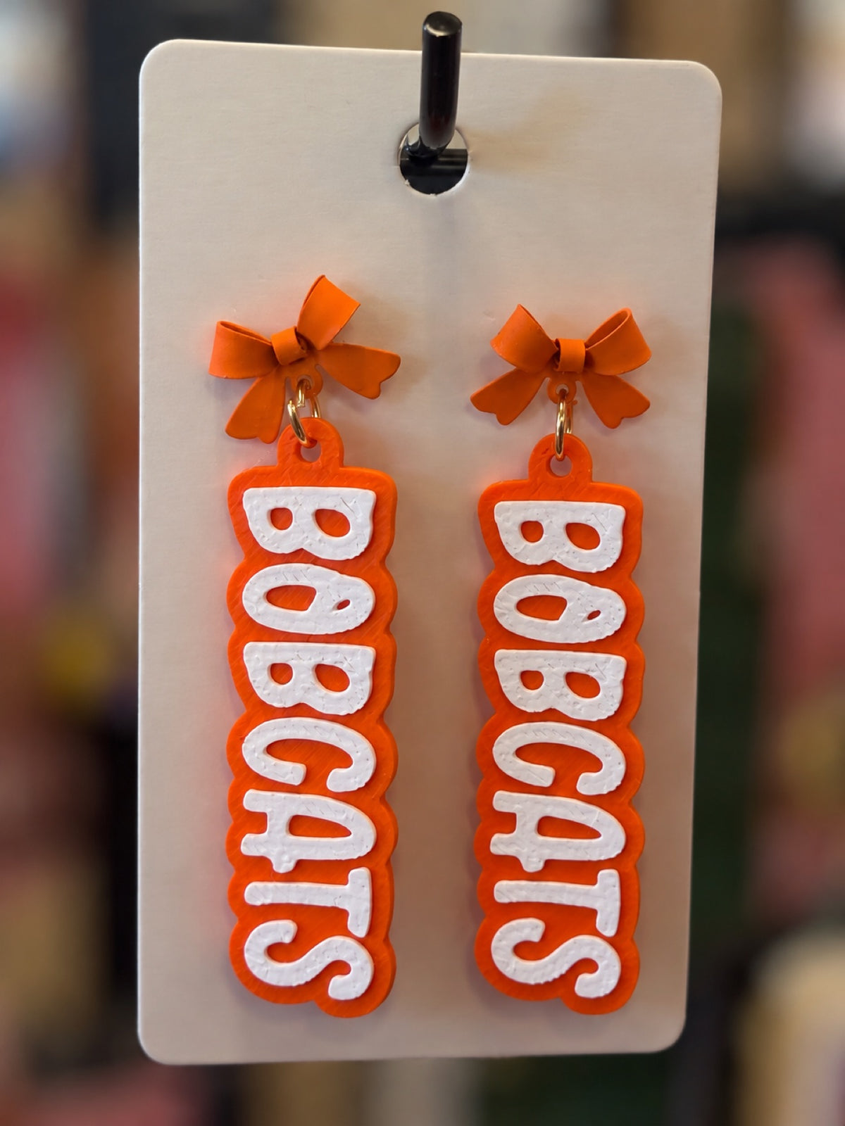 3D printed BOBCATS dangle earrings with painted alloy bow tops - Celina Bobcats game day earrings