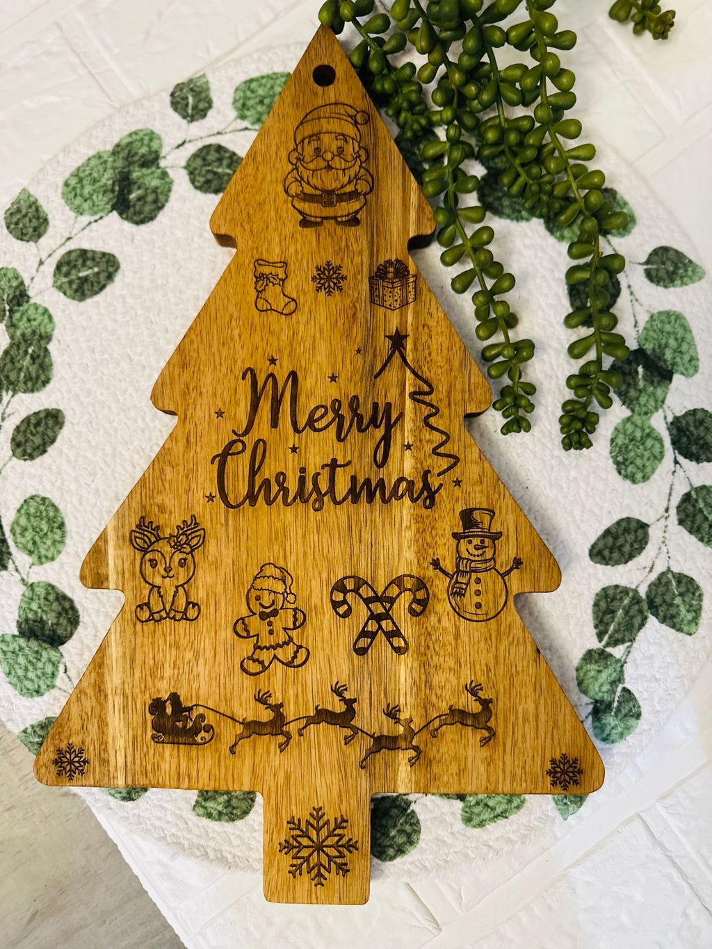 Christmas tree shaped wooden serving board laser-engraved with Merry Christmas, Santa, reindeer and snowman – festive holiday tray
