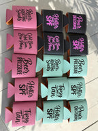 Leatherette can coolers in pink, black, and mint with funny beer sayings