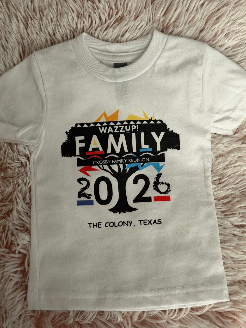 Custom white toddler DTF t-shirt with Wazzup Family reunion 2026 print