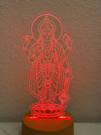 Lord Satyanarayana acrylic LED lamp glowing red on wooden base - color changing night light