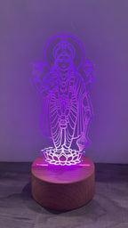 Video showing Lord Satyanarayana LED lamp changing colors - purple, pink and blue