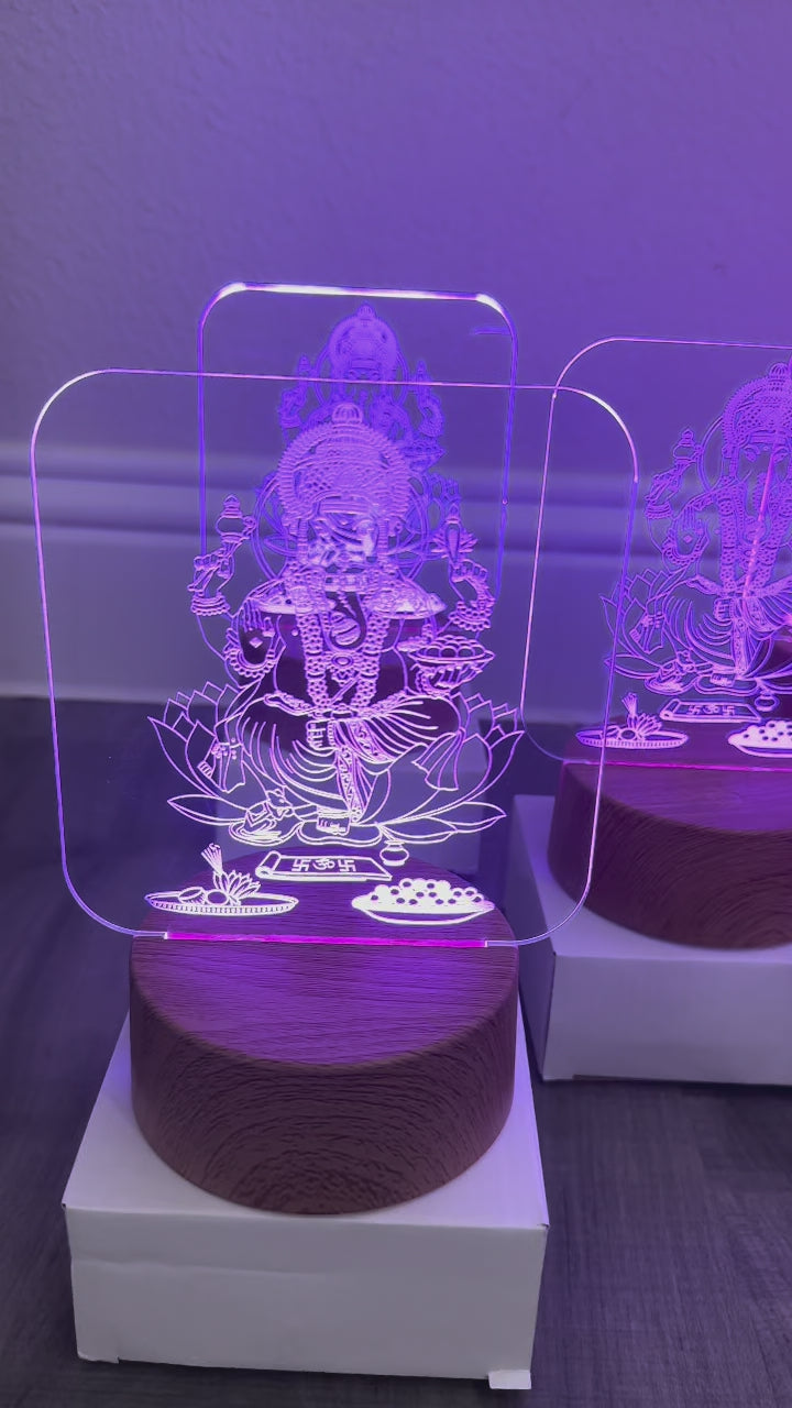 Video of Lord Ganesha LED lamp glowing – 3D laser engraved acrylic night light